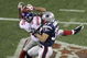 GLENDALE, AZ - FEBRUARY 03:  David Tyree #85 of the New York Giants catches a 32-yard pass from Eli Manning #10 as Rodney Harrison #37 of the New England Patriots attempts to knock it out in the fourth quarter of Super Bowl XLII on February 3, 2008 at the University of Phoenix Stadium in Glendale, Arizona. The Giants defeated the Patriots 17-14.  (Photo by Doug Pensinger/Getty Images)