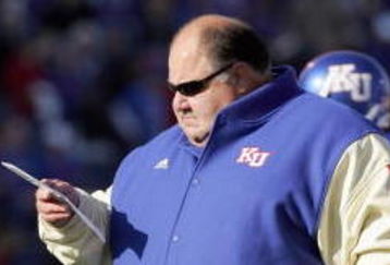 LAWRENCE, KS - NOVEMBER 18:  Mark Mangino  of the Kansas Jayhawks stands on the field during the game against the Kansas State Wildcats on November 18, 2006 at Memorial Stadium in Lawrence, Kansas.  Kansas won 39-20.  (Photo by Brian Bahr/Getty Images)