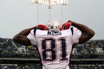 OAKLAND, CA - DECEMBER 14: Randy Moss #81 of the New England Patriots celeberates after scoring a touchdown against the Oakland Raiders during an NFL game on December 14, 2008 at the Oakland-Alameda County Coliseum in Oakland, California.  (Photo by Jed Jacobsohn/Getty Images)
