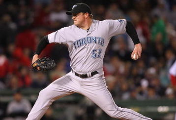 BOSTON - MAY 1:  B.J. Ryan #52 of the Toronto Blue Jays pitches against the Boston Red Sox on May 1, 2008 at Fenway Park in Boston, Massachusetts. (Photo by Elsa/Getty Images)