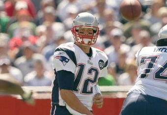 FOXBORO, MA - SEPTEMBER 7:  Quarterback Tom Brady #12 of the New England Patriots passes the ball up the middle during their NFL game against the Kansas City Chiefs on September 7, 2008 at Gillette Stadium in Foxboro, Massachusetts. The Patriots defeated the Chiefs 17-10. (Photo by Elsa Garrison/Getty Images)