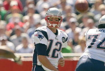 FOXBORO, MA - SEPTEMBER 7:  Quarterback Tom Brady #12 of the New England Patriots passes the ball up the middle during their NFL game against the Kansas City Chiefs on September 7, 2008 at Gillette Stadium in Foxboro, Massachusetts. The Patriots defeated the Chiefs 17-10. (Photo by Elsa Garrison/Getty Images)