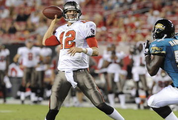 TAMPA, FL - AUGUST 23:  Quarterback Luke McCown #12 of the Tampa Bay Buccaneers sets to pass against the Jacksonville Jaguars at Raymond James Stadium on August 23, 2008 in Tampa, Florida.   (Photo by Al Messerschmidt/Getty Images)