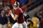 TUSCALOOSA, AL - NOVEMBER 29:  Quarterback Greg McElroy #12 of the Alabama Crimson Tide rolls out to pass against the Auburn Tigers at Bryant-Denny Stadium on November 29, 2008 in Tuscaloosa, Alabama. Alabama defeated Auburn 36-0.  (Photo by Doug Benc/Getty Images)