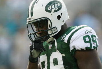 JACKSONVILLE, FL - OCTOBER 8:  Defensive end Bryan Thomas #99 of the New York Jets walks off the field against the Jacksonville Jaguars at Alltel Stadium on October 8, 2006 in Jacksonville, Florida. The Jags defeated the Jets 41-0.  (Photo by Doug Benc/Getty Images)