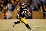 PITTSBURGH - JANUARY 18:  Troy Polamalu #43 of the Pittsburgh Steelers returns an interception 40 yards for a touchdown against the Baltimore Ravens during the fourth quarter of the AFC championship game on January 18, 2009 at Heinz Field in Pittsburgh, Pennsylvania.  (Photo by Gregory Shamus/Getty Images)