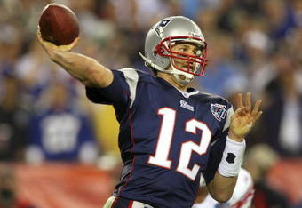 GLENDALE, AZ - FEBRUARY 03:  Quarterback Tom Brady #12 of the New England Patriots drops back to pass against the New York Giants the second half of Super Bowl XLII on February 3, 2008 at the University of Phoenix Stadium in Glendale, Arizona. The Giants defeated the Patriots 17-14.  (Photo by Donald Miralle/Getty Images)