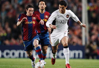 BARCELONA, SPAIN - APRIL 23:  Cristiano Ronaldo (R) of Manchester United holds off the challenge of Lionel Messi (L) of Barcelona during the UEFA Champions League Semi-Final, first leg match between Barcelona and Manchester United at the Camp Nou stadium on April 23, 2008 in Barcelona, Spain.  (Photo by Jasper Juinen/Getty Images)