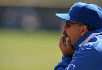 CHICAGO - APRIL 09:  Manager Trey Hillman #22 of the Kansas City Roayls looks on against the Chicago White Sox at U.S. Cellular Field on April 9, 2009 in Chicago, Illinois.  (Photo by Jonathan Daniel/Getty Images)