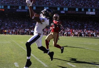 SAN FRANCISCO - OCTOBER 07:   Demetrius Williams #87 of the Baltimore Ravens catches a pass out of bounds against Walt Harris #27 of the San Francisco 49ers during an NFL game on October 7, 2007 at Monster Park in San Francisco, California.   (Photo by Jed Jacobsohn/Getty Images)  