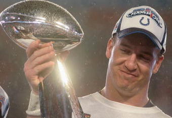 MIAMI GARDENS, FL - FEBRUARY 04:  Quarterback Peyton Manning #18 of the Indianapolis Colts smiles as he holds the Vince Lombardi Super Bowl trophy after his team won the Super Bowl XLI 29-17 over the Chicago Bears on February 4, 2007 at Dolphin Stadium in Miami Gardens, Florida.  (Photo by Donald Miralle/Getty Images)