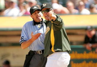 OAKLAND, CA - MAY 09:  Oakland Athletics manager Bob Geren argues with home plate umpire Paul Nauert after Matt Holliday #5 of the Oakland Athletics struck out against the Toronto Blue Jays on May 9, 2009 at the Oakland Coliseum in Oakland, California.  Geren was thrown out of the game for arguing. (Photo by Ezra Shaw/Getty Images)