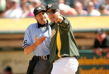 OAKLAND, CA - MAY 09:  Oakland Athletics manager Bob Geren argues with home plate umpire Paul Nauert after Matt Holliday #5 of the Oakland Athletics struck out against the Toronto Blue Jays on May 9, 2009 at the Oakland Coliseum in Oakland, California.  Geren was thrown out of the game for arguing. (Photo by Ezra Shaw/Getty Images)