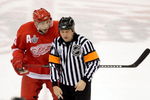DETROIT - JUNE 02:  Pavel Datsyuk #13 of the Detroit Red Wings reacts to referee Dan O'Halloran during game five of the 2008 NHL Stanley Cup Finals against the Pittsburgh Penguins jat Joe Louis Arena on June 2, 2008 in Detroit, Michigan. The Penguins defeated the Red Wings 4-3 in triple overtime to set the series at 3-2 Red Wings.  (Photo by Jim McIsaac/Getty Images)