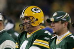 GREEN BAY, WI - NOVEMBER 6:  Quarterbacks Brett Favre #4 and Aaron Rodgers #12 of the Green Bay Packers watch the final minutes of a game against the Pittsburgh Steelers from the sideline November 6, 2005 at Lambeau Field in Green Bay, Wisconsin. The Steelers defeated the Packers, 20-10.  (Photo by Jonathan Daniel/Getty Images)