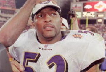28 Jan 2001:  Ray Lewis #52 of the Baltimore Ravens gets congradulated after the Super Bowl XXXV Game against the New York Giants at the Raymond James Stadium in Tampa, Florida. The Ravens defeated the Giants 34-7.Mandatory Credit: Andy Lyons  /Allsport