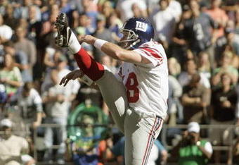 SEATTLE - SEPTEMBER 24:  Jeff Feagles #18 of the New York Giants punts during the NFL game against the Seattle Seahawks at Qwest Field on September 24, 2006 in Seattle, Washington. The Seahawks won 42-30. (Photo by Otto Greule Jr/Getty Images)