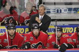 CALGARY, CANADA - MAY 3:  Head Coach Darryl Sutter of the Calgary Flames looks on against the Anaheim Mighty Ducks into the boards in game seven of the Western Conference Quarterfinals during the 2006 NHL Stanley Cup Playoffs on May 3, 2006 at the Pengrowth Saddledome in Calgary, Alberta, Canada. Anaheim defeated Calgary 3-0 and win the series 4-3. (Photo by Jeff Vinnick/Getty Images) 