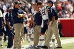 FOXBORO, MA - SEPTEMBER 7:  Quarterback Tom Brady #12 of the New England Patriots walks off the field with the aid of the Patriots staff after being injured on a play during their NFL game against the Kansas City Chiefs on September 7, 2008 at Gillette Stadium in Foxboro, Massachusetts. The Patriots defeated the Chiefs 17-10. (Photo by Elsa Garrison/Getty Images)
