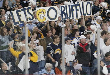 BUFFALO - APRIL 25:  Buffalo Sabres fans cheer on their team in Game 1 of the Eastern Conference Semifinals against the New York Rangers during the 2007 NHL Stanley Cup Playoffs on April 25, 2007 at HSBC Arena in Buffalo, New York.  The Sabres beat the Rangers 5-2.  (Photo by: Rick Stewart/Getty Images)