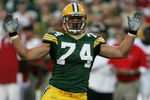 GREEN BAY, WI - AUGUST 19:   Aaron Kampman #74 of the Green Bay Packers pleads to the referee after hitting Michael Vick #7 of the Atlanta Falcons on August 19, 2006 at Lambeau Field in Green Bay, Wisconsin.   (Photo by Jonathan Daniel/Getty Images)