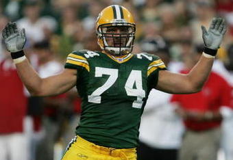 GREEN BAY, WI - AUGUST 19:   Aaron Kampman #74 of the Green Bay Packers pleads to the referee after hitting Michael Vick #7 of the Atlanta Falcons on August 19, 2006 at Lambeau Field in Green Bay, Wisconsin.   (Photo by Jonathan Daniel/Getty Images)