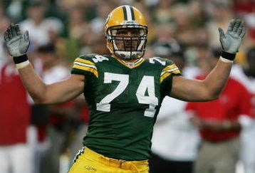 GREEN BAY, WI - AUGUST 19:   Aaron Kampman #74 of the Green Bay Packers pleads to the referee after hitting Michael Vick #7 of the Atlanta Falcons on August 19, 2006 at Lambeau Field in Green Bay, Wisconsin.   (Photo by Jonathan Daniel/Getty Images)
