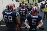 ORCHARD PARK, NY - DECEMBER 28:  Langston Walker #68, Duke Preston #75 and Trent Edwards #5 of the Buffalo Bills wait to walk on the field before the game against the New England Patriots on December 28, 2008 at Ralph Wilson Stadium in Orchard Park, New York. (Photo by Rick Stewart/Getty Images)