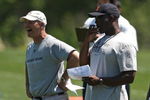LAKE FOREST, IL - MAY 20: Head coach Lovie Smith of the Chicago Bears (R) and defensive line coach Rod Marinelli watch an organized team activity (OTA) practice on May 20, 2009 at Halas Hall in Lake Forest, Illinois. (Photo by Jonathan Daniel/Getty Images)
