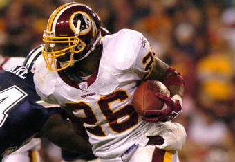 LANDOVER, MD - DECEMBER 18:  Clinton Portis #26 of the Washington Redskins runs the ball against the Dallas Cowboys on December 18, 2005 at FedEx Field in Landover, Maryland. The Redskins won 35-7.  (Photo by Larry French/Getty Images)