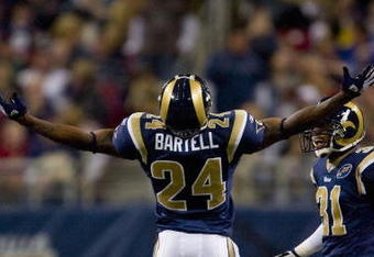 ST. LOUIS, MO - DECEMBER 21: Ron Bartell #24 of the St. Louis Rams celebrates an interception against the San Francisco 49ers at the Edward Jones Dome on December 21, 2008 in St. Louis, Missouri.  The 49ers beat the Rams 17-16.  (Photo by Dilip Vishwanat/Getty Images)