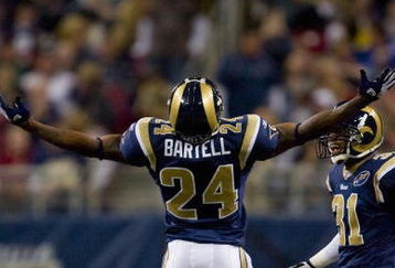 ST. LOUIS, MO - DECEMBER 21: Ron Bartell #24 of the St. Louis Rams celebrates an interception against the San Francisco 49ers at the Edward Jones Dome on December 21, 2008 in St. Louis, Missouri.  The 49ers beat the Rams 17-16.  (Photo by Dilip Vishwanat/Getty Images)