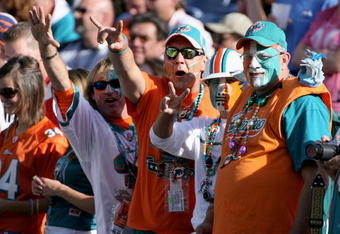 DENVER - NOVEMBER 02:  Fans of the Miami Dolphins turn out to support their team as they face the Denver Broncos during NFL action at Invesco Field at Mile High on November 2, 2008 in Denver, Colorado.  (Photo by Doug Pensinger/Getty Images)