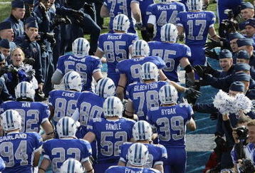 AIR FORCE ACADEMY, CO - NOVEMBER 11: The Air Force Falcons runs onto the field before the game against the Notre Dame Fighting Irish on November 11, 2006 at Falcon Stadium on the Air Force Academy near Colorado Springs, Colorado.  (Photo by Brian Bahr/Getty Images)