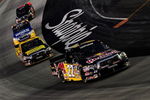BRISTOL, TN - AUGUST 20:  Scott Speed, driver of the #22 Red Bull Toyota leads a group of trucks during the NASCAR Craftsman Truck Series O'Reilly 200 at Bristol Motor Speedway on August 20, 2008 in Bristol, Tennesse.  (Photo by Rusty Jarrett/Getty Images for NASCAR)
