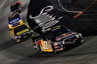 BRISTOL, TN - AUGUST 20: Scott Speed, driver of the #22 Red Bull Toyota leads a group of trucks during the NASCAR Craftsman Truck Series O'Reilly 200 at Bristol Motor Speedway on August 20, 2008 in Bristol, Tennesse. (Photo by Rusty Jarrett/Getty Images for NASCAR)