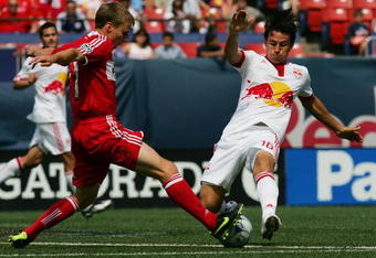 EAST RUTHERFORD, NJ - MAY 24:  Chris Rolfe #17 of the Chicago Fire battle for the ball against Alfredo Pacheco #16 of the New York Red Bulls at Giants Stadium in the Meadowlands on May 24, 2009 in East Rutherford, New Jersey.  Chicago Fire defeats the New York Red Bulls 1-0  (Photo by Chris Trotman/Getty Images for New York Red Bull)
