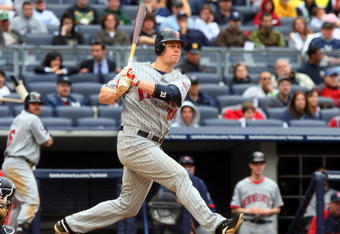 NEW YORK - MAY 17:  Justin Morneau #33 of the Minnesota Twins bats against the New York Yankees on May 17, 2009 at Yankee Stadium in the Bronx borough of New York City. The Yankees defeated the Twins 3-2 in ten innings.  (Photo by Jim McIsaac/Getty Images)
