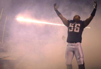 SAN DIEGO - DECEMBER 24:  Shawne Merriman #56 of the San Diego Chargers enters the game against the Denver Broncos during the first half of their NFL game at Qualcomm Stadium December 24, 2007 in San Diego, California.  (Photo by Donald Miralle/Getty Images)
