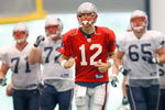 FOXBORO, MA - JULY 24:  Tom Brady #12 of the New England Patriots participates in a drill during the first day of training camp at Gillette Stadium on July 24, 2008 in Foxboro, Massachusetts.  (Photo by Jim Rogash/Getty Images)