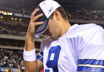 PHILADELPHIA - DECEMBER 28:  Tony Romo #9 of the Dallas Cowboys walks off the field after playing the Philadelphia Eagles on December 28, 2008 at Lincoln Financial Field in Philadelphia, Pennsylvania. The Eagles defeated the Cowboys 44-6.  (Photo by Jim McIsaac/Getty Images)