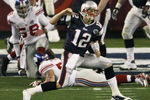 GLENDALE, AZ - FEBRUARY 03:  Quarterback Tom Brady #12 of the New England Patriots celebrates a second quarter touchdown against the New York Giants during Super Bowl XLII on February 3, 2008 at the University of Phoenix Stadium in Glendale, Arizona.  (Photo by Win McNamee/Getty Images)