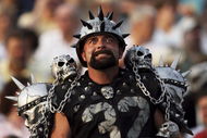 CANTON, OH - AUGUST 06: A Raider fan gets ready before the Oakland Raiders take on the Philadelphia Eagles in the AFC-NFC Pro Football Hall of Fame Game at Fawcett Stadium on August 6, 2006 in Canton, Ohio. (Photo by Doug Benc/Getty Images)