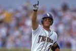 17 Jun 2000:  Jeremy Witten #3 of the Louisiana State Tigers points #1 as he runs around the bases during the College World Series Game against the Stanford Cardinal at Rosenblatt Stadium in Omaha, Nebraska.  The Tigers defeated the Cardinal 6-5. Mandatory Credit: Andy Lyons  /Allsport