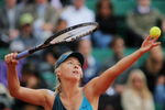PARIS - MAY 27:  Maria Sharapova of Russia serves during her Women's Singles Second Round match against Nadia Petrova of Russia on day four of the French Open at Roland Garros on May 27, 2009 in Paris, France.  (Photo by Matthew Stockman/Getty Images)