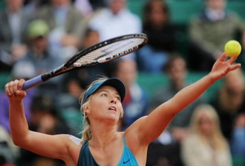 PARIS - MAY 27:  Maria Sharapova of Russia serves during her Women's Singles Second Round match against Nadia Petrova of Russia on day four of the French Open at Roland Garros on May 27, 2009 in Paris, France.  (Photo by Matthew Stockman/Getty Images)