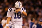 SAN DIEGO - JANUARY 03:  Quarterback Peyton Manning #18 of the Indianapolis Colts walks off the field during the AFC Wild Card Game against the San Diego Chargers on January 3, 2009 at Qualcomm Stadium in San Diego, California.  (Photo by Harry How/Getty Images)