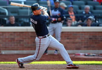 NEW YORK - MAY 13:  Jeff Francoeur #7 of the Atlanta Braves bats against the New York Mets on May 13, 2009 at Citi Field in the Flushing neighborhood of the Queens borough of New York City. The Braves defeated the Mets 8-7 in twelve innings.  (Photo by Jim McIsaac/Getty Images)