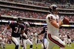 HOUSTON - DECEMBER 28:  Greg Olsen #82 of the Chicago Bears makes a catch for a touchdown in front of Brandon Harrison #31 of the Houston Texans during the second half at the Reliant Stadium on December 28, 2008 in Houston, Texas. The Texans won 31-24.  (Photo by Harry How/Getty Images)