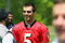 OWINGS MILLS, MARYLAND - MAY 8: Joe Flacco #5 of the Baltimore Ravens talks during minicamp at the practice facility on May 8, 2009 in Owings Mills, Maryland. (Photo by Ned Dishman/Getty Images)